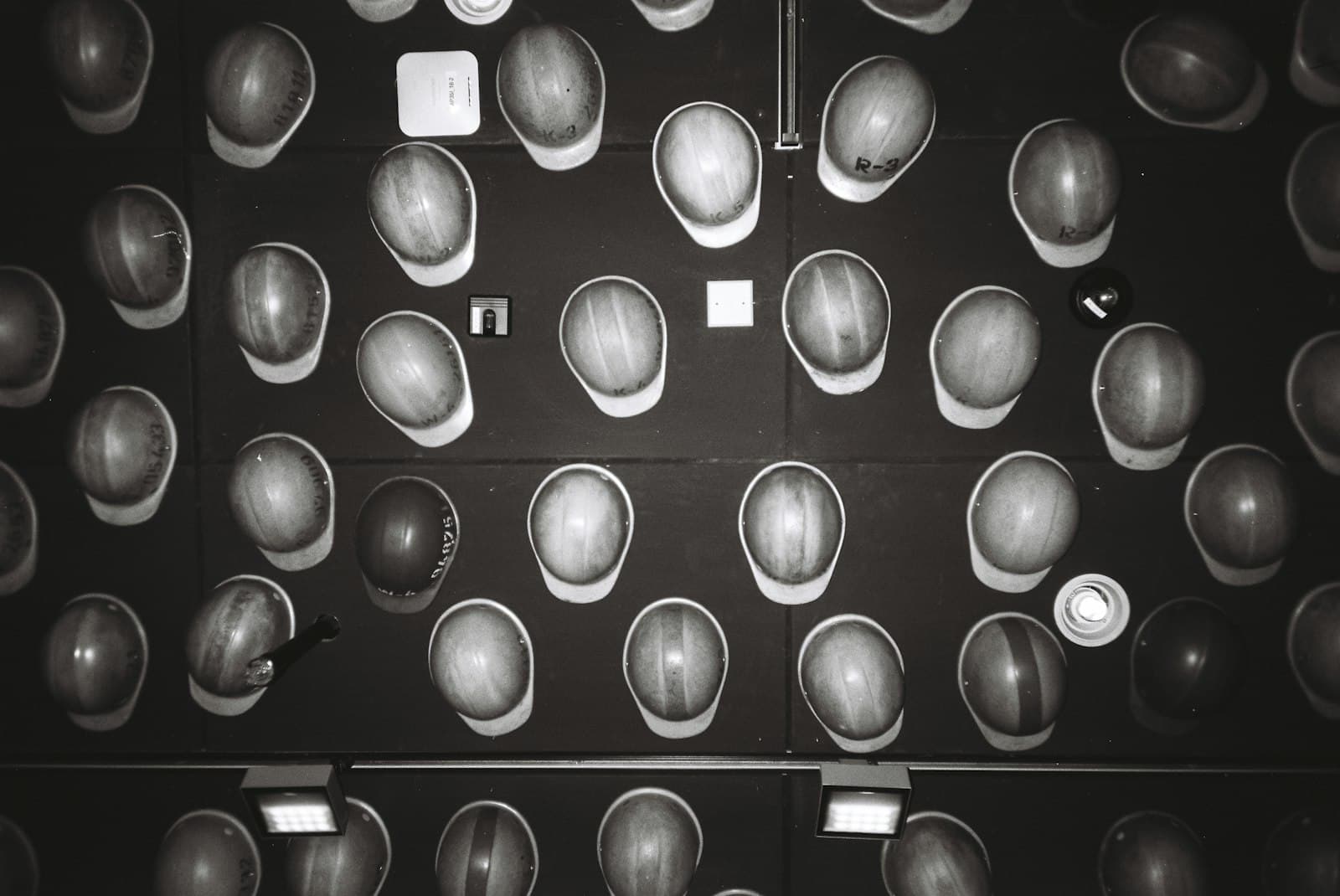 Hard hats belonging to construction and engineering teams